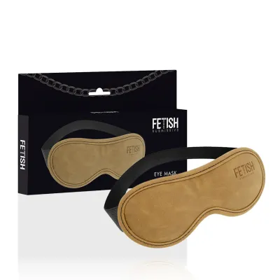 Brown eye mask with black band, packaging in the background with chain motif and "Fetish Submissive" inscription.