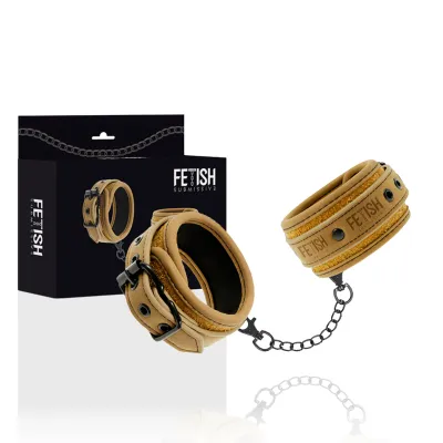 Brown handcuffs with chain, packaging in the background, inscription "Fetish Submissive".