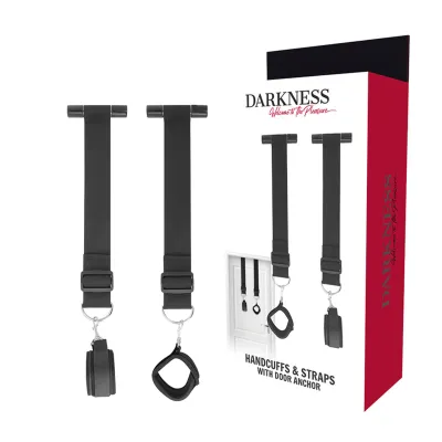 Black handcuffs and straps with door anchor, packaging with the inscription "Darkness: Welcome to the Pleasure".