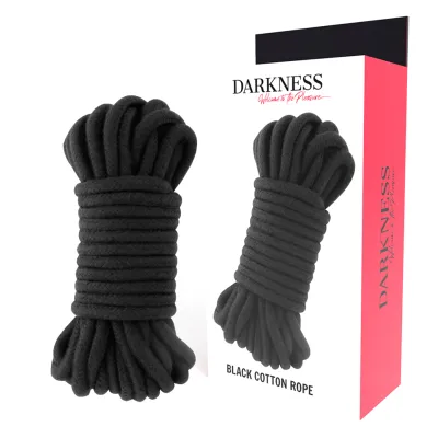 Black cotton rope in front of packaging labeled "Darkness".