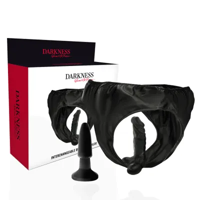 Schwarzer Strap-on mit austauschbarem Dildo und Verpackung der Marke "Darkness".