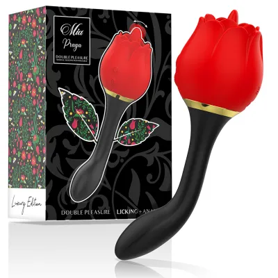 Red, rose-shaped massage device with a black handle, next to decorative packaging with a floral pattern.