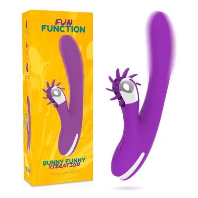Lila Vibrator mit rotierenden Elementen, Verpackung im Hintergrund, gelber Karton mit Aufschrift "Bunny Funny Vibration".