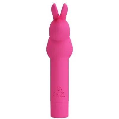 Pink, rabbit-shaped object with a smooth surface and CE marking.