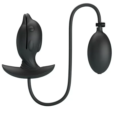 Black, fish-shaped silicone toy with pump and hose, on a white background.