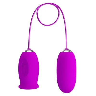 Purple vibrator egg with remote control, connected by a cable, on a white background.