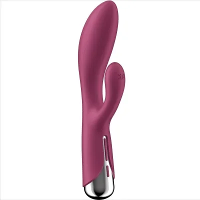 Rosa Vibrator mit zwei Armen und silbernem Griff, auf weißem Hintergrund.