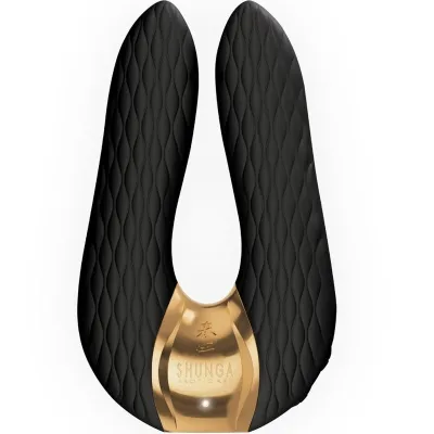 Black, U-shaped massage device with gold accents and a textured surface.