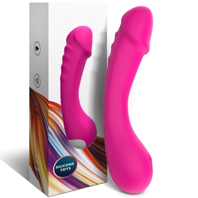 Pinkes Silikonspielzeug neben bunter Verpackung mit der Aufschrift "Silicone Toys".