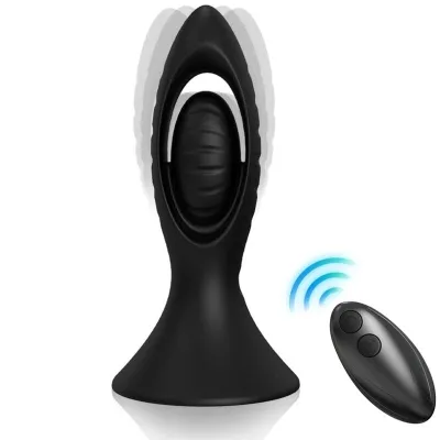 Black, remote-controlled massage device with vibration effect, next to it a black remote control with two buttons.