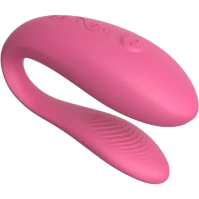 Rosa, U-förmiger Vibrator mit glatter Oberfläche und geripptem Ende, geeignet für intime Anwendungen.