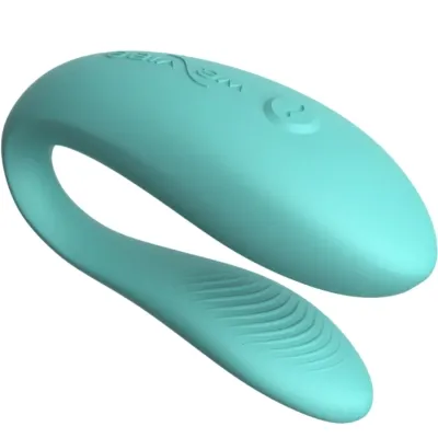 Türkises, gebogenes Silikon-Sextoy mit strukturiertem Ende und Knopf auf der Oberseite.