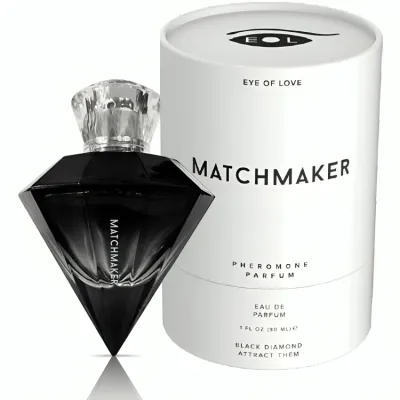Black, diamond-shaped perfume bottle "Matchmaker" next to white packaging with the inscription "Eye of Love".