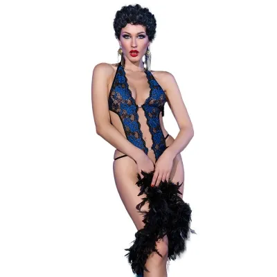 Person in blue and black lace underwear with a feather boa, posing in front of a white background.