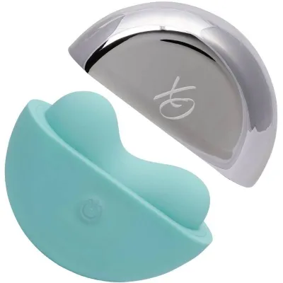 Turquoise curved object with a silver cover bearing a logo.