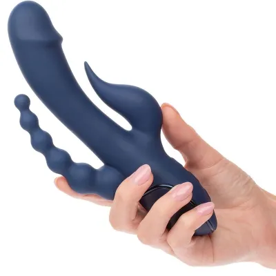 Hand hält blauen Vibrator mit mehreren Armen und wellenförmigem Design.
