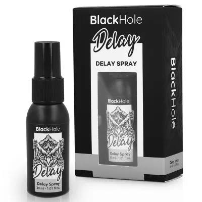 Schwarzes Sprayfläschchen und Verpackung mit Eulenmotiv, Text "BlackHole Delay Spray", 30 ml.