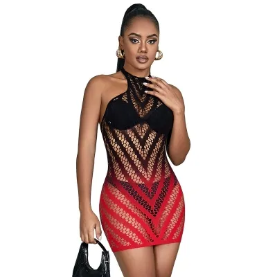 Woman in a black and red mesh dress with handbag, wearing gold earrings and with a high ponytail.