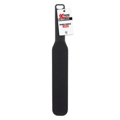 Black paddle with studs and label "Extreme BDSM Gear, Spiked Paddle Large".