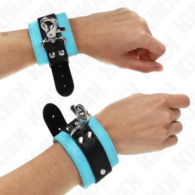 Two hands with blue and black leather restraints, connected by a metal hook.