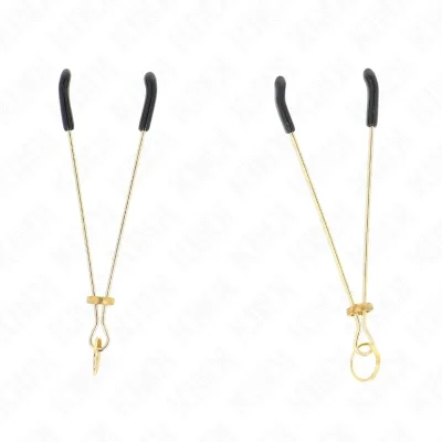 Two golden nipple clamps with black rubber tips on a white background.