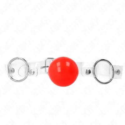 Red ball gag with transparent strap and metal rings on a white background.