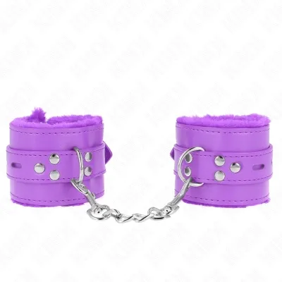 Purple plush handcuffs with chain, silver studs and buckles, on a white background.