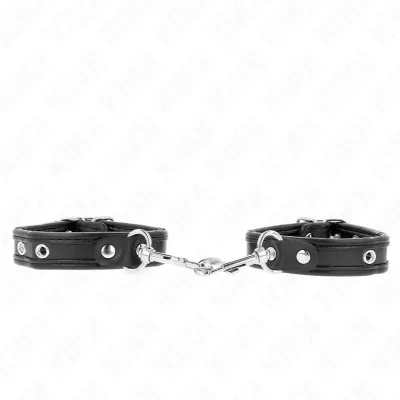 Black leather restraints with metal connection on a white background.