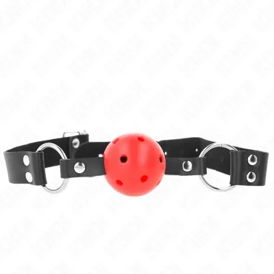 Black leather strap with red ball and metal rings, used as a gag.