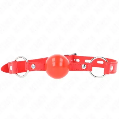 Rotes Ballknebel mit verstellbarem Riemen und Metallringen, auf weißem Hintergrund.