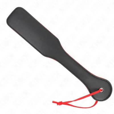 Black leather paddle with red rim and red loop, on a white background.