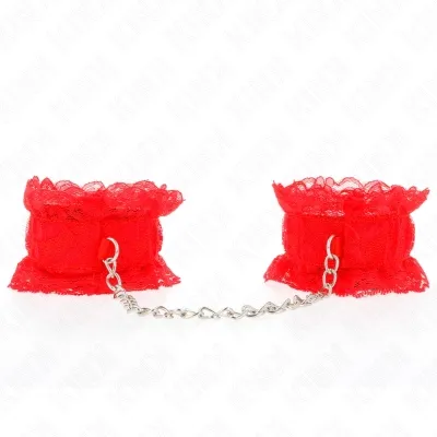 Red lace handcuffs with chain on a white background.
