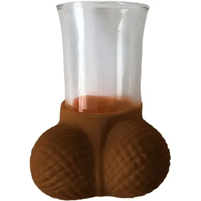 A glass with a brown, nut-shaped base that resembles two acorns.