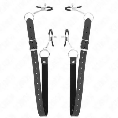 Black leather straps with metal rings and adjustable clips, on a white background.