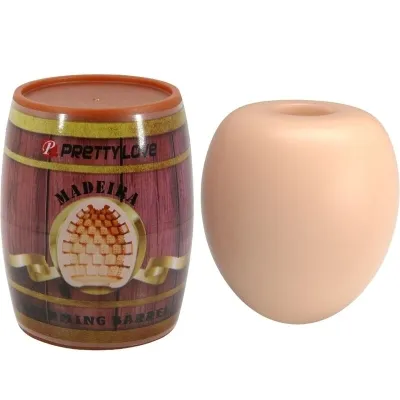 Two objects: A barrel labeled "Pretty Love Madeira" and a flesh-colored cylindrical object.