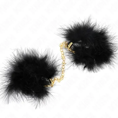 Black, fluffy handcuffs with a golden chain on a white background.
