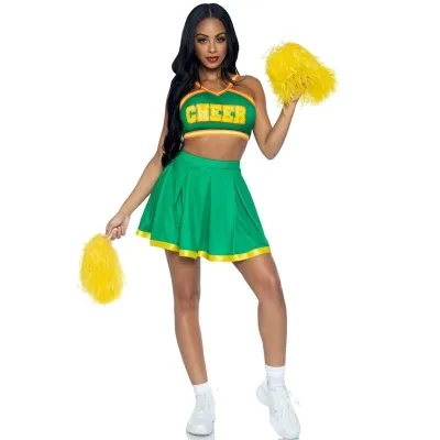 Frau in grün-gelbem Cheerleader-Outfit mit Pompons, steht aufrecht, lächelt, weiße Turnschuhe.