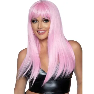 A woman with long, pink hair and a black top smiles at the camera.
