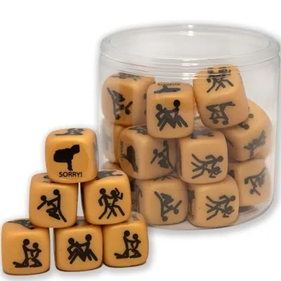 Beige cubes with black stick figure illustrations in a transparent container.