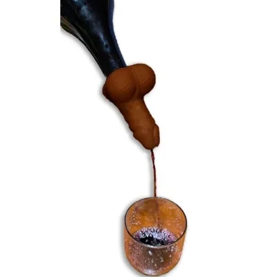 Wine bottle with an unusual spout that pours into a glass.