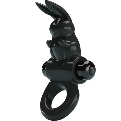 Black ring with a rabbit figure, shiny and modern design.