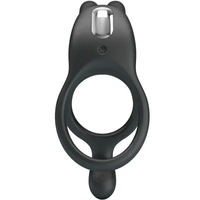 Black silicone ring with integrated vibrator and on/off switch, top view.