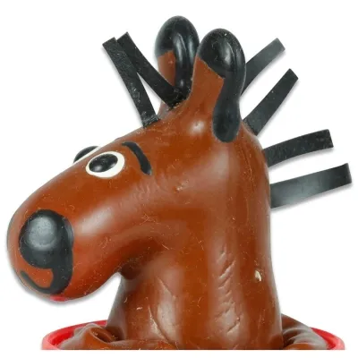 Brown rubber horse with black mane stripes and large eyes, on a red base.