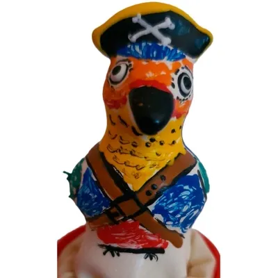 A colorful parrot wearing a pirate hat and eye patch, painted on an egg.