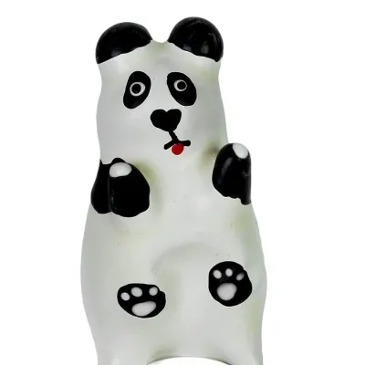 Toy panda with black ears and paws, red tongue, standing upright.