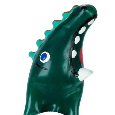Green dinosaur figure with an open mouth, white teeth and blue eyes.