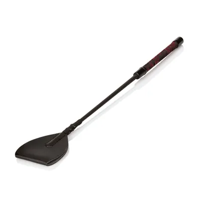 Black riding crop with red handle on a white background.