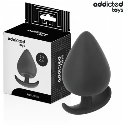 Schwarzer Analplug von Addicted Toys, 9,5 cm, neben der Verpackung.