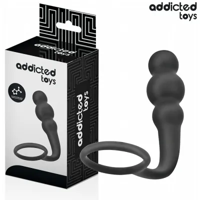 Black sex toy with ring and balls, next to a package labeled "addicted toys".