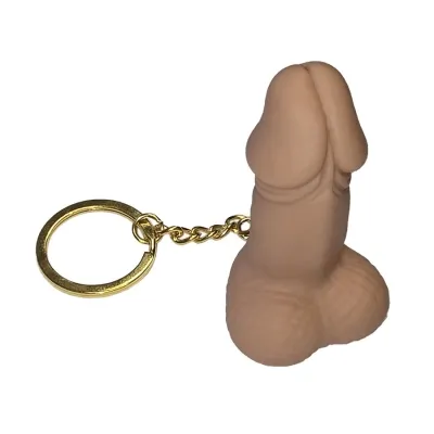 Schlüsselanhänger in Form eines Penis mit goldener Kette und Ring.